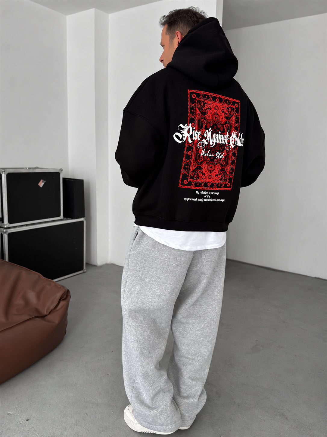 Black oversized hoodie with red carpet back graphic