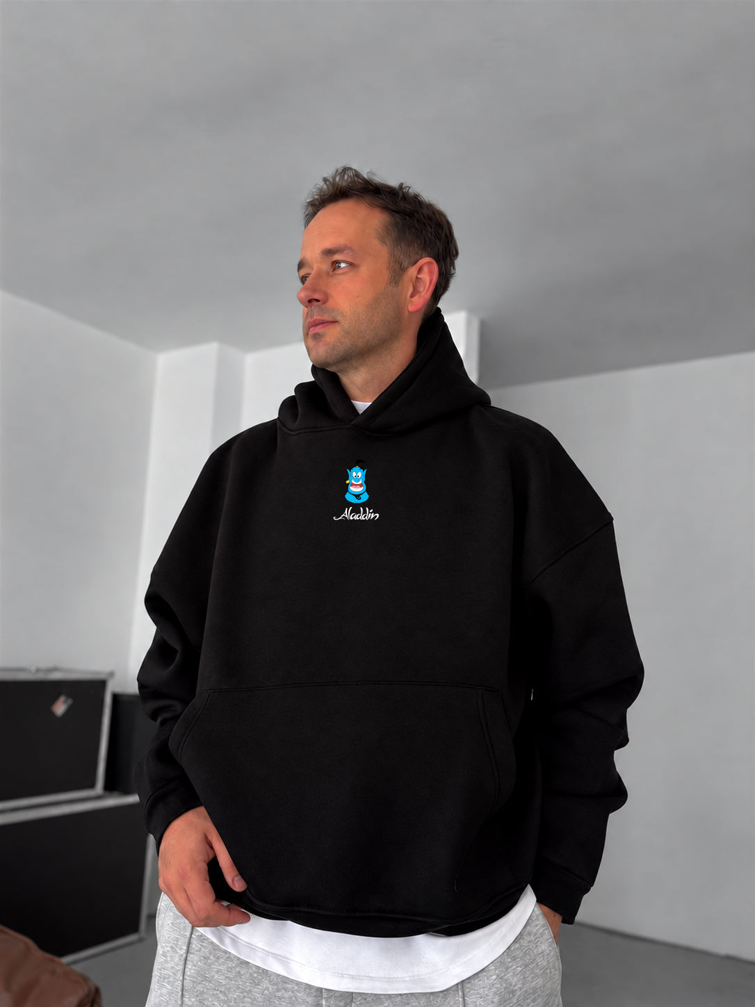 Black Aladdin printed oversized hoodie, front view
